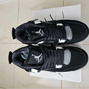 Jordan Black and White High-Top Sneakers